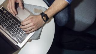 Man using a laptop.